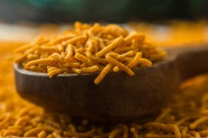 famous Indian extruded potato dish known as aloo bhujia.